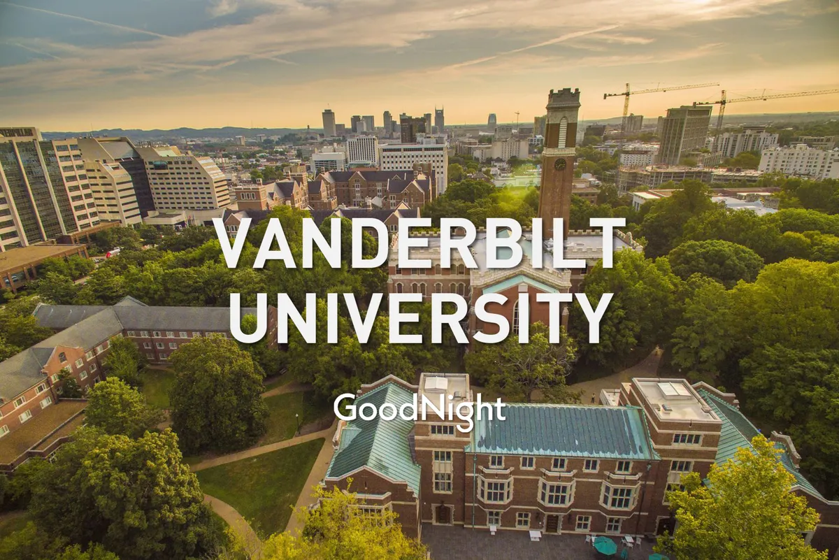 A scenic view of Vanderbilt University's historic clock tower rising above treetops, with the city skyline in the background. The image conveys a mix of academic inspiration and local greenery.